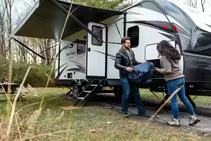 RV Lifestyle - couple packing rv for a road trip