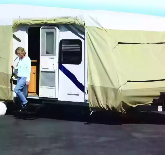 Woman in Trailer with RV Cover