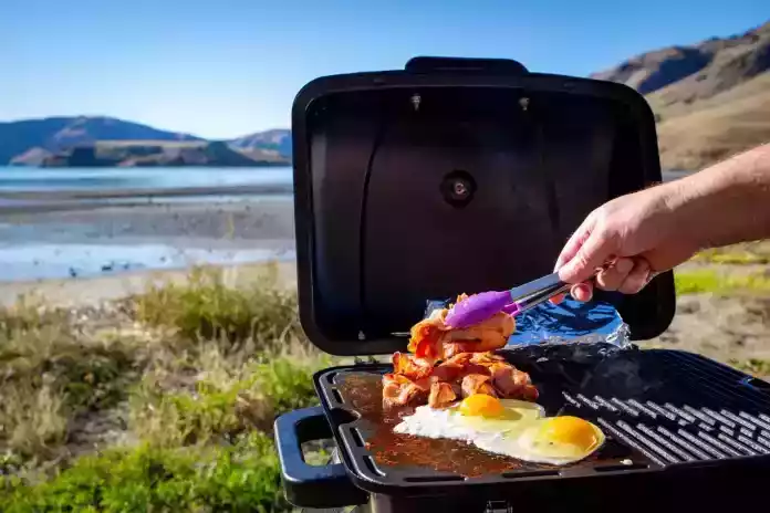 outdoor grill by lake