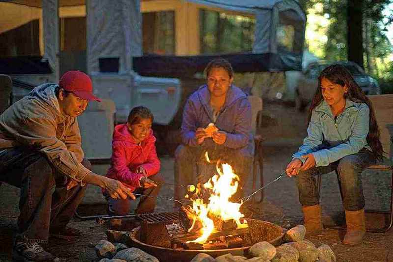 roasting marshmallows around the campfire